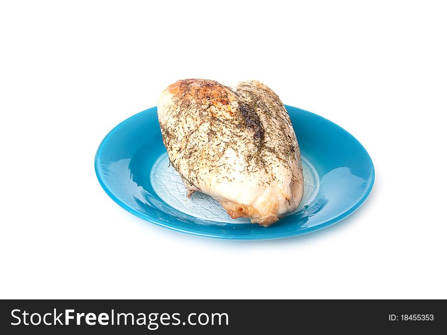 Chicken on blue plate on a white background