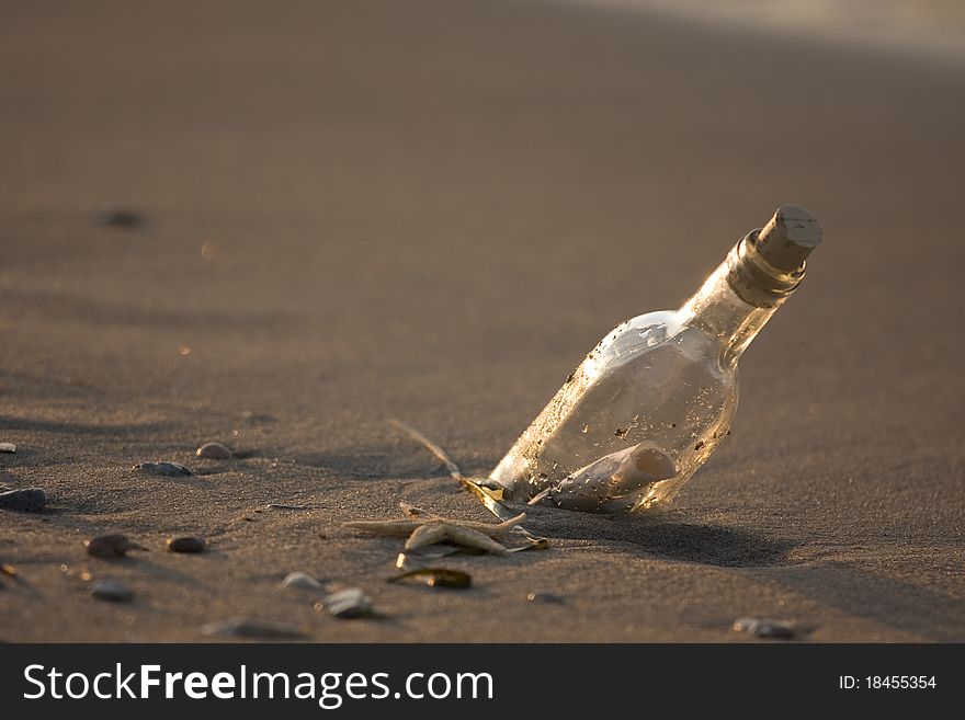 A message in the bottle on sand