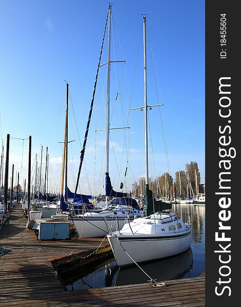 Sailboats masts and walking platform, Portland OR. Sailboats masts and walking platform, Portland OR.