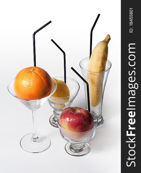 You surround and glasses with a fruit piece in each one. You surround and glasses with a fruit piece in each one