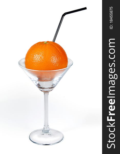 Martini glass with an orange. Martini glass with an orange