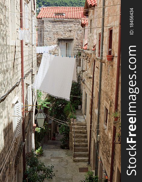 Alley with laundry hanging on a line