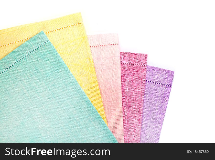 Several different towels are on the table