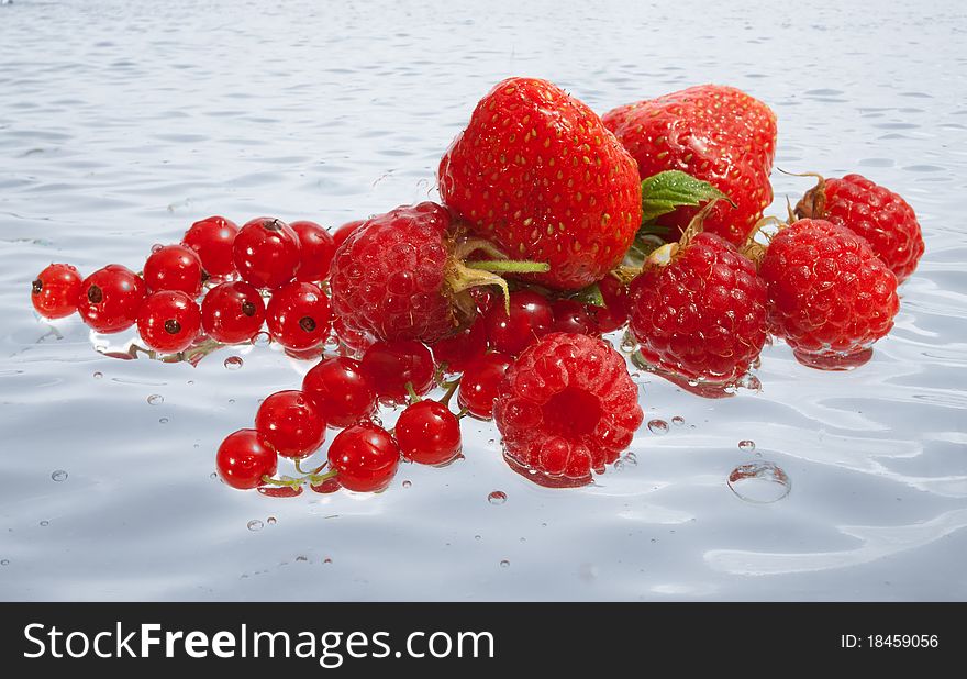 Fresh Ripe Berries On The Water