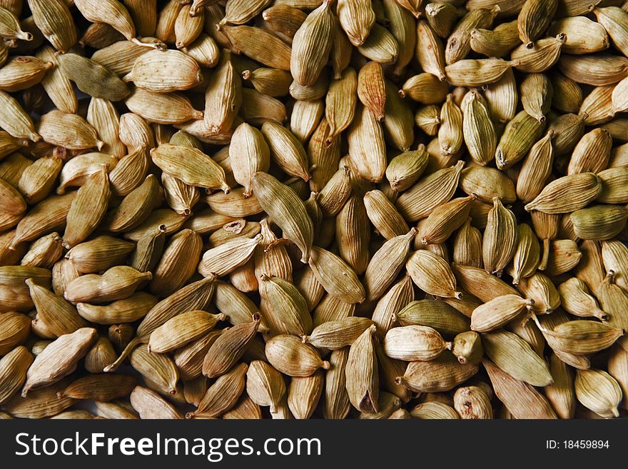 Cardamom pods as a food background. Cardamom pods as a food background