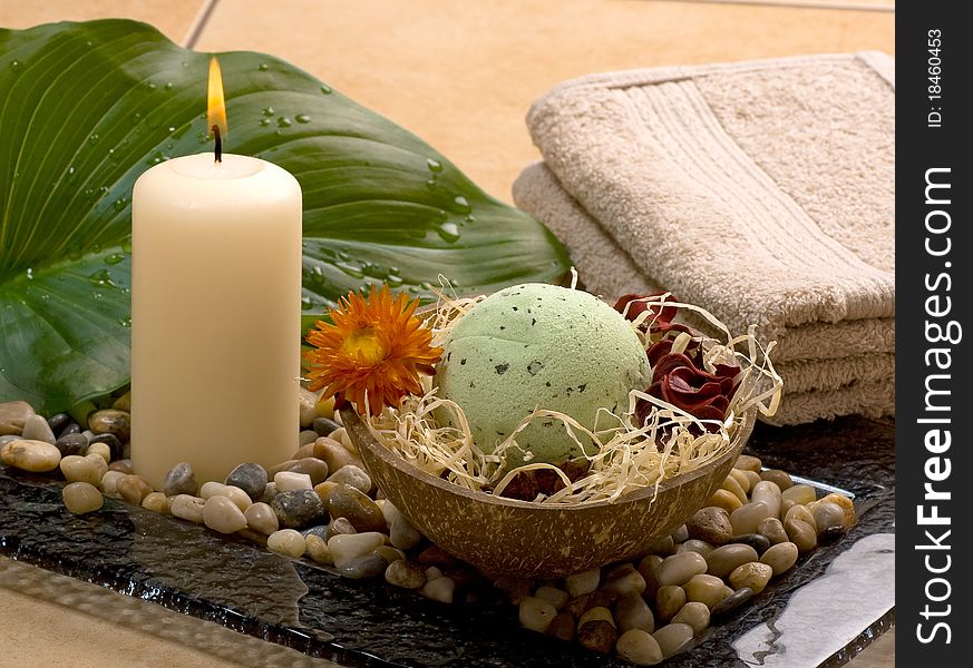 Burning candle with soap, flower and towel. Burning candle with soap, flower and towel