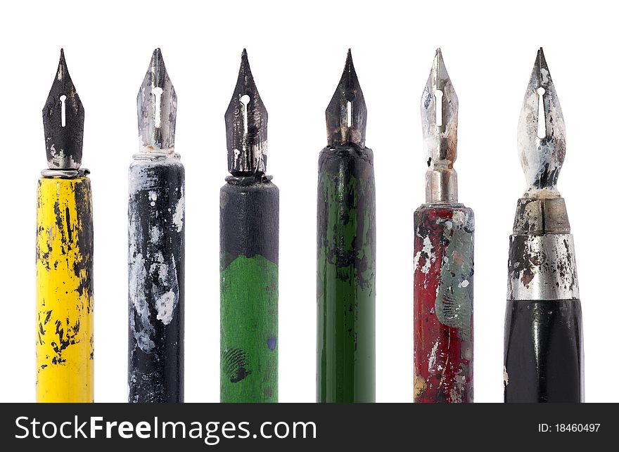 Collection of old colorful pens isolated on white