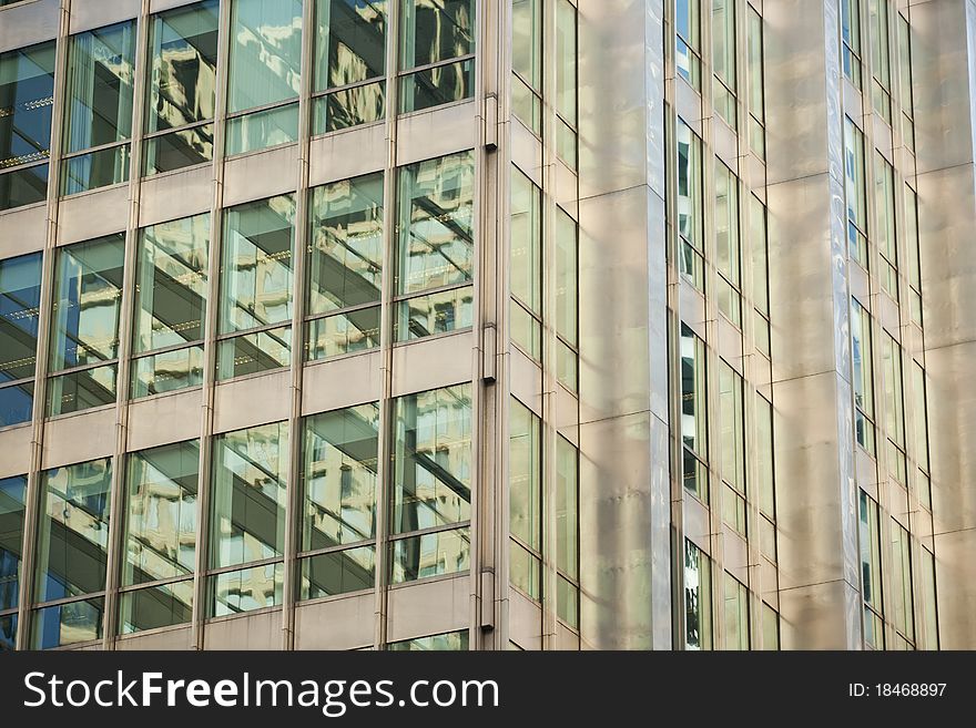 Detail of a modern steel and glass office building. Detail of a modern steel and glass office building