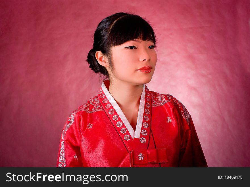 Elegant chinese model in traditional red dress