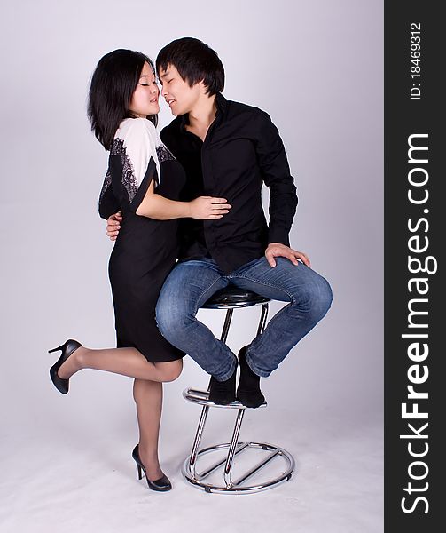 Beautiful asian loving couple in a studio.