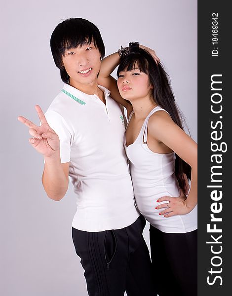 Beautiful asian loving couple in a studio.