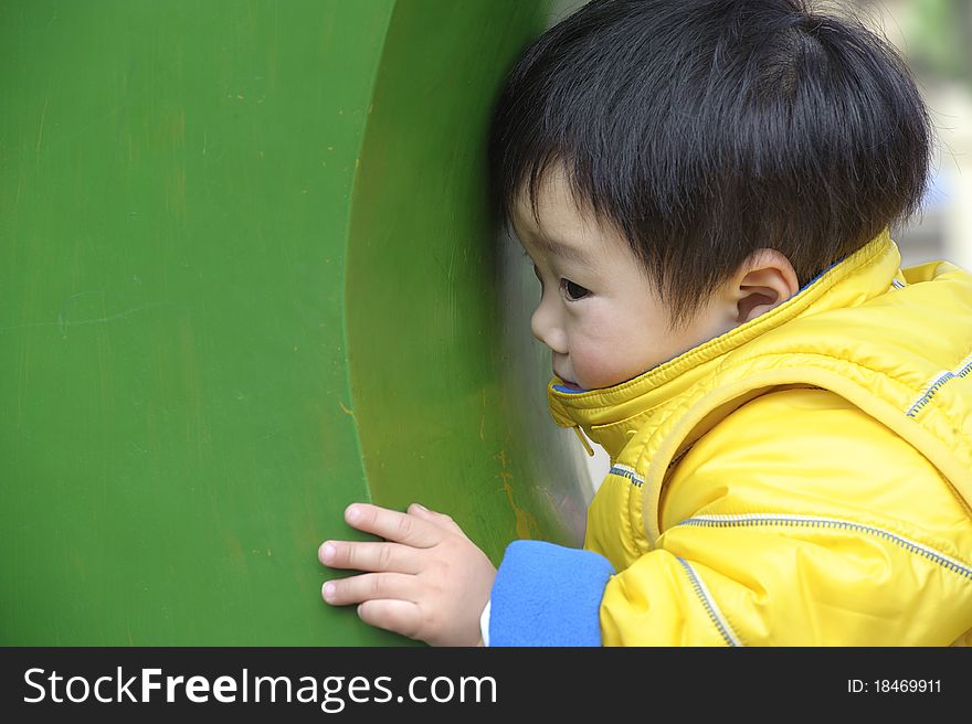 A cute baby is playing. A cute baby is playing