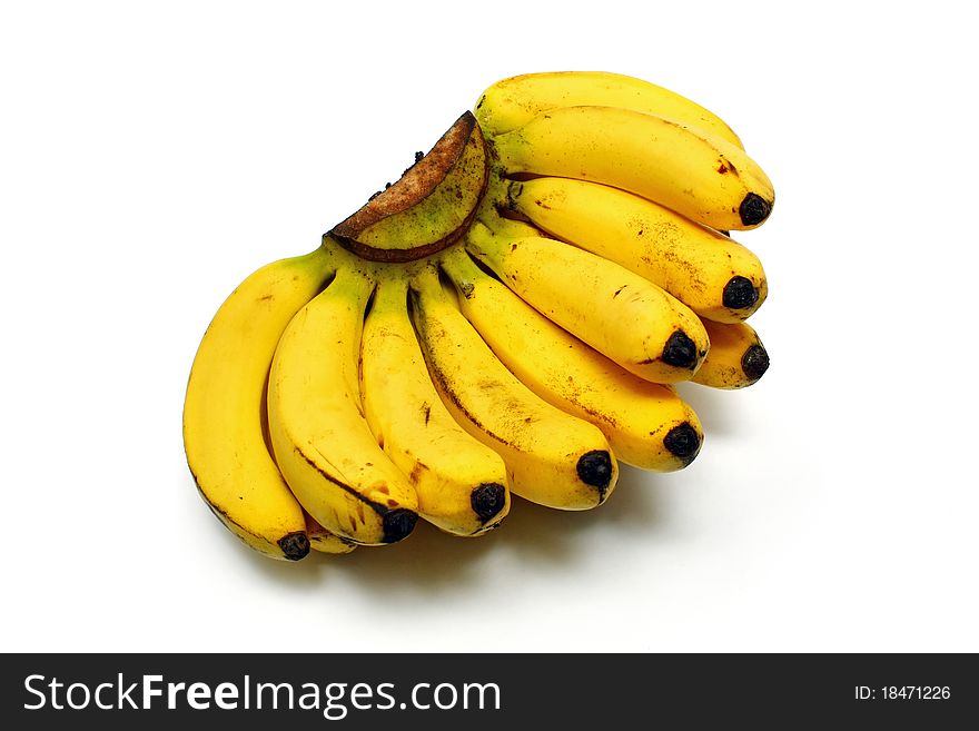 A string of bananas isolated on white background.