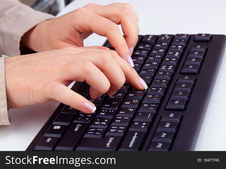 Women's hands on the keyboard. Women's hands on the keyboard