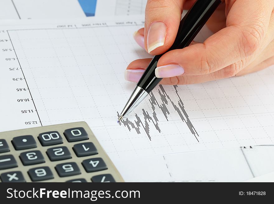 Financial charts and graphs on the table