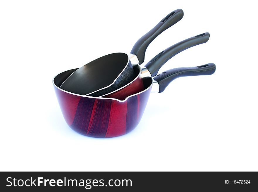 Three pans isolated on white background.