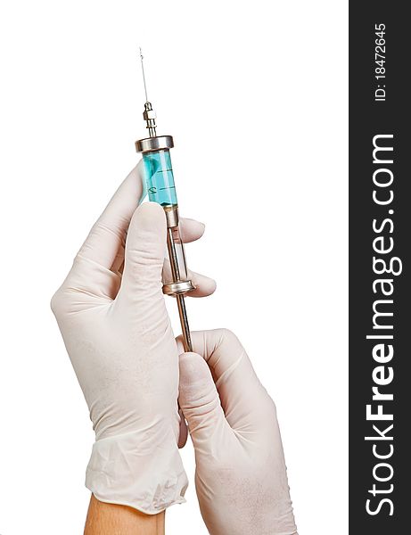 Syringe with a medicine in a hand