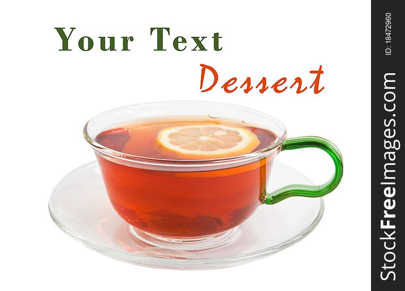 Tea with a lemon in a glass cup isolated on a white background