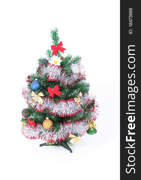Christmas tree with toys on a white background.