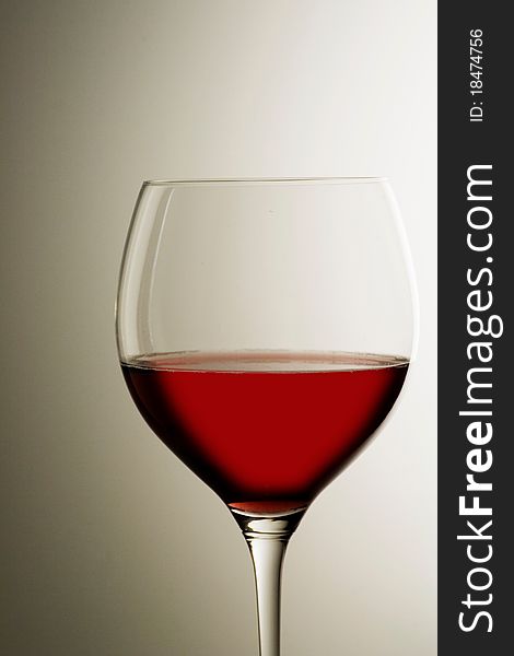 A wine glass on a background