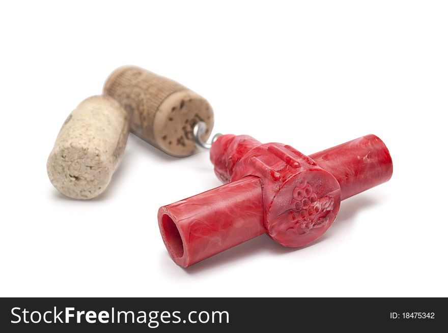 A corkscrew with used cork isolated on white.