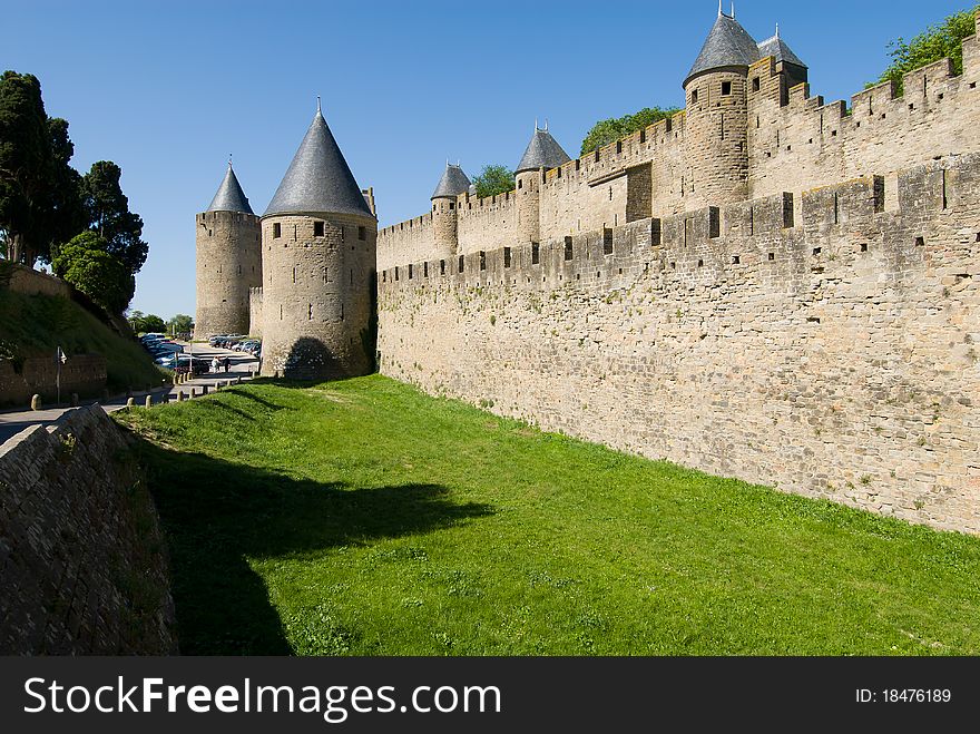 Carcassone is a fortified chateau in Aude south france. This showed tower,stone wall and moat. Carcassone is a fortified chateau in Aude south france. This showed tower,stone wall and moat.