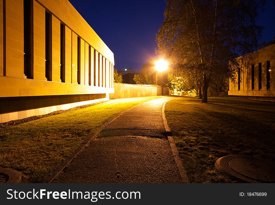 A low angle view of a tarmac path in Hobart, Tasmania, at night. A low angle view of a tarmac path in Hobart, Tasmania, at night.