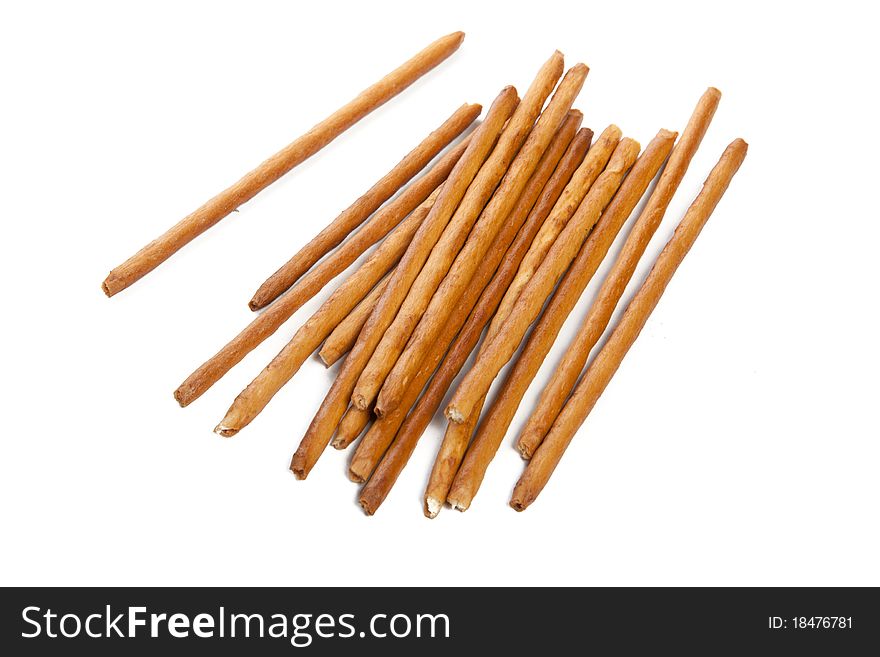 Bread-straw is on a white background. Closeup.