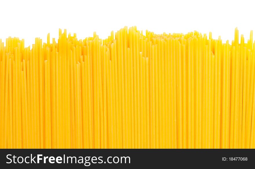 Uncooked pasta on white background