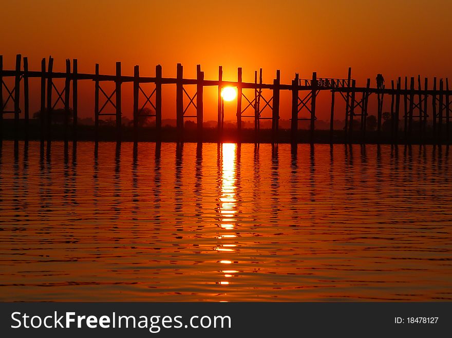 Landscape of an old wooden bridge at sunset. Landscape of an old wooden bridge at sunset