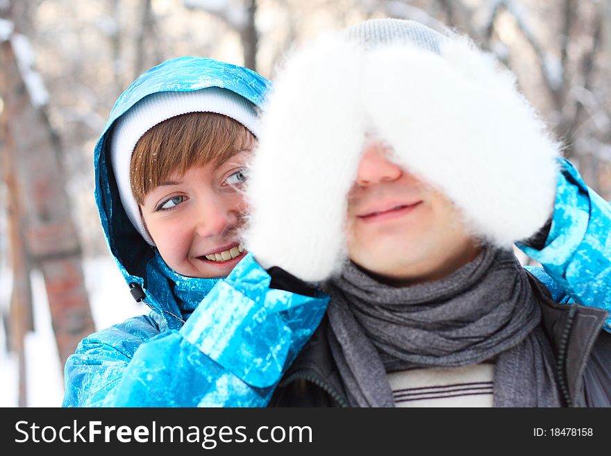 Young Playful Couple Has A Fun. Winter