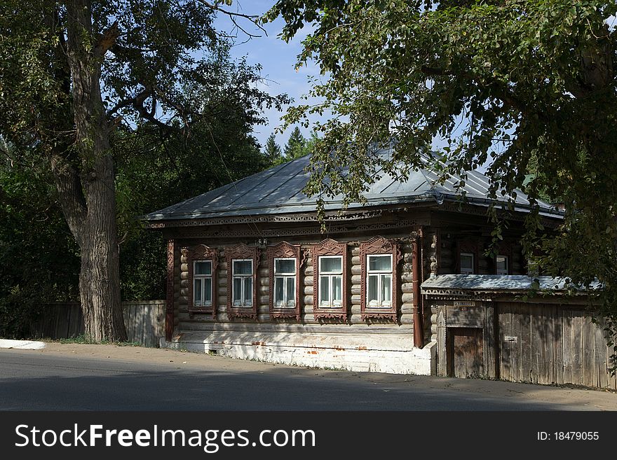 Old wooden house (log cabin) in traditional Russian style in Tarusa town, Russia. Old wooden house (log cabin) in traditional Russian style in Tarusa town, Russia.