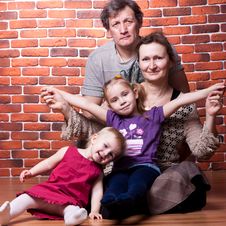 Happy Seniors Couple With Grandchildren Royalty Free Stock Photos
