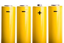 Four Yellow Batteries Standing Stock Photo Four Yellow Batteries Standing Stock Photo