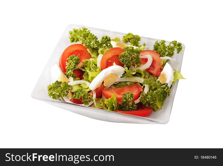 Salad of tomatoes, eggs and greens
