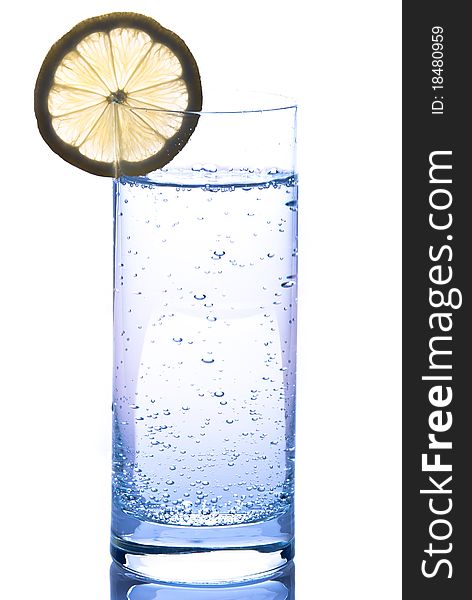 Water glass with lemon