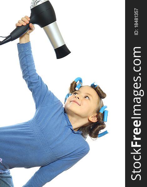 Little girl posing with hair dryer