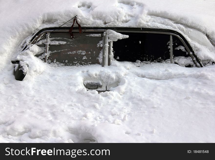 A Car In The Heavy Snow