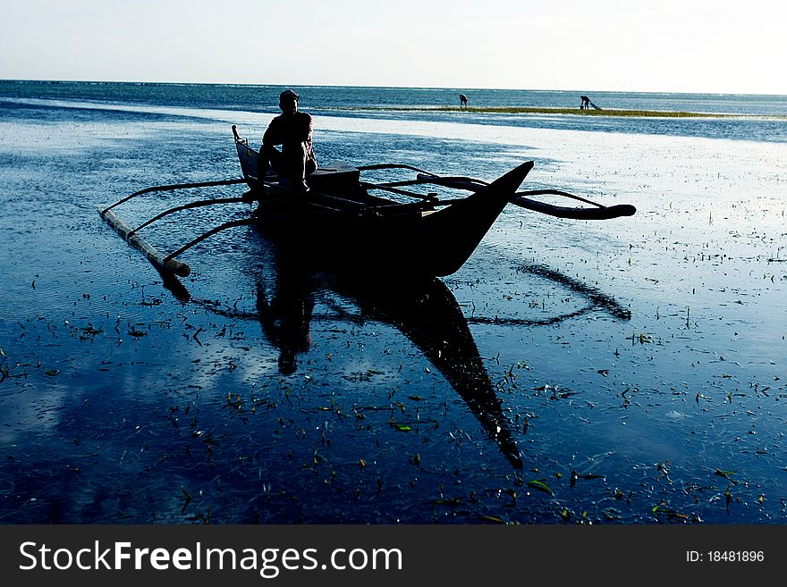 Philippino Boat On Water At Sunrise