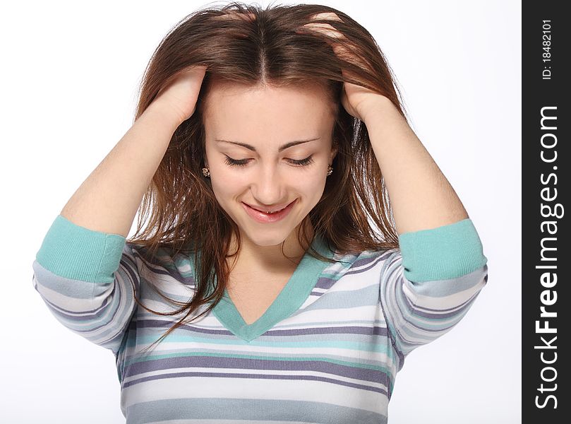 Portrait of young beautiful brunette girl in striped casual jumper