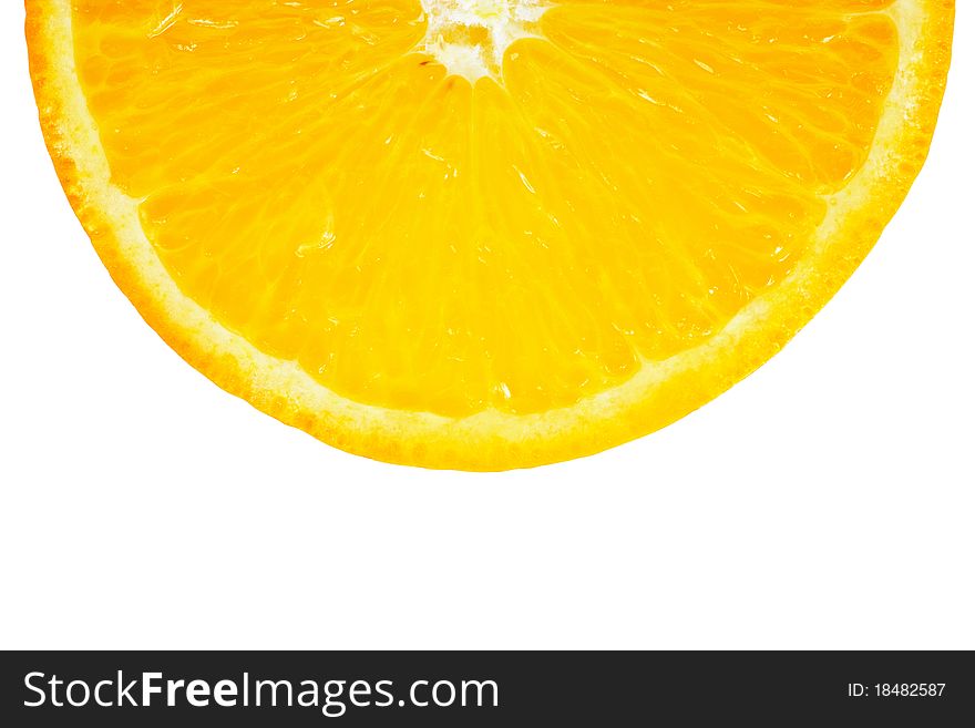 Section of orange isolated over white. Closeup view.