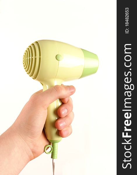 Hair dryer in hand