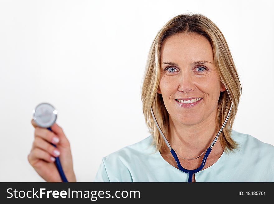 Beautiful blond nurse with stethoscope. Beautiful blond nurse with stethoscope