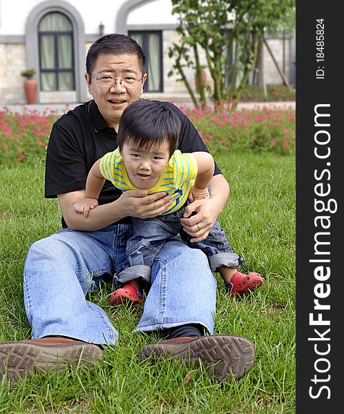 Baby playing with his father. Baby playing with his father