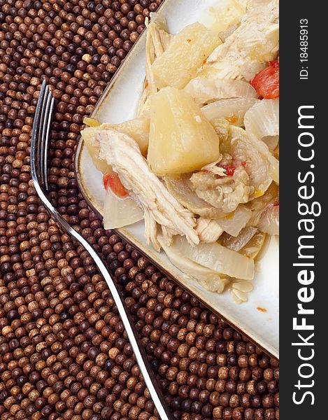 Tropical Chicken Dinner on Plate with Fork.