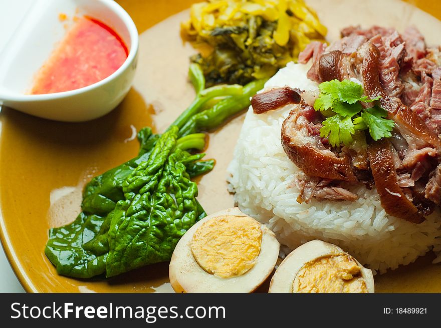 Simmerd pork shank on rice. Simmerd pork shank on rice