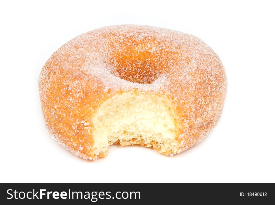 Sugar Ring Donut With Bite Missing On White