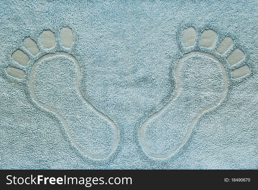 Terry towel with footprints, a blue color.