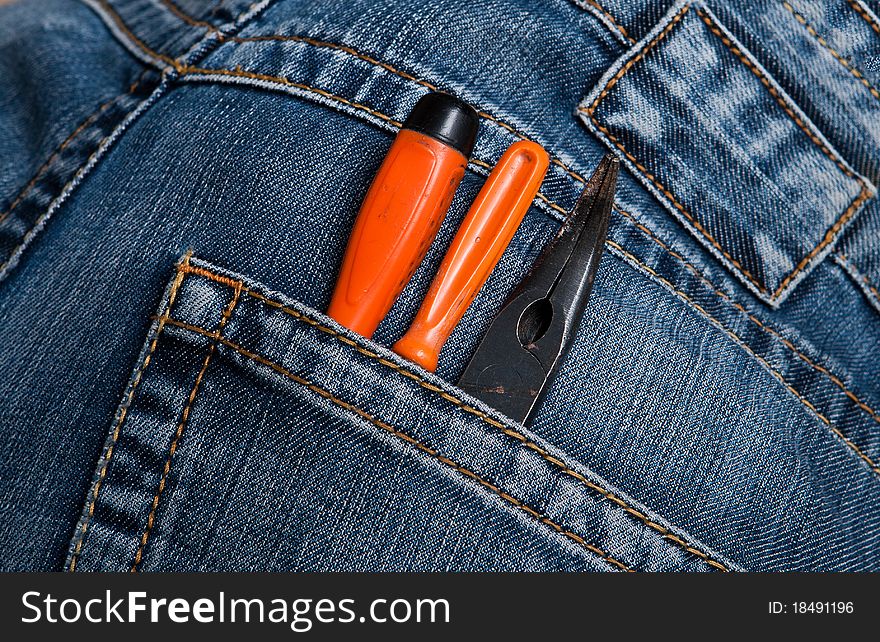 Screwdriver pliers in the pocket. Screwdriver pliers in the pocket