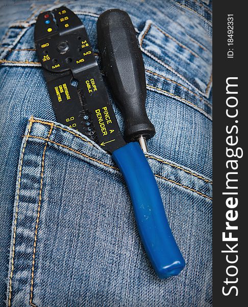 Screwdriver pliers in the pocket. Screwdriver pliers in the pocket